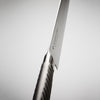 TOJIRO PROの別角度からのフォルム。  職人が手作業で行う刃付けにより生まれる切れ味。材質はVG10（V金10号）。