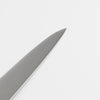 TOJIRO PRO ペティナイフ の刃先 。 職人の手作業による刃付けが鋭い切れ味を生む。材質はVG10（V金10号）。